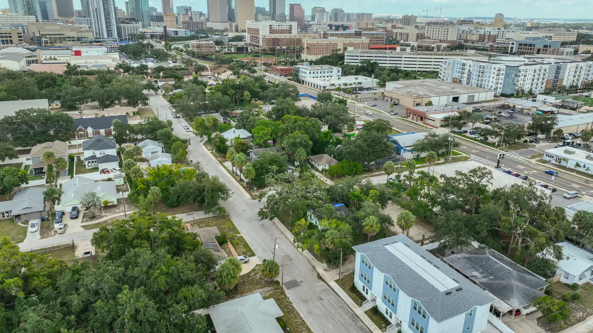 Aerial view of 1206 W Lemon in North Hyde Park with the downtown Tampa skyline behind it