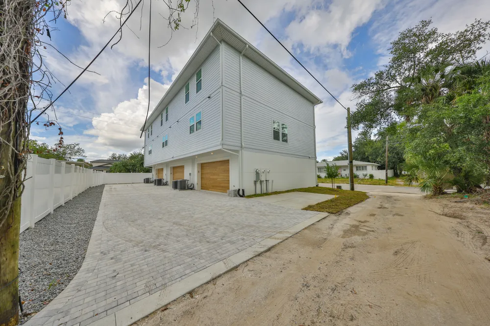 Rear drive and attached garages at the 1206 W Lemon townhomes