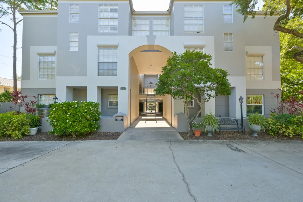 The entry walk and landscaping at a South Tampa attached community, maintained by the association
