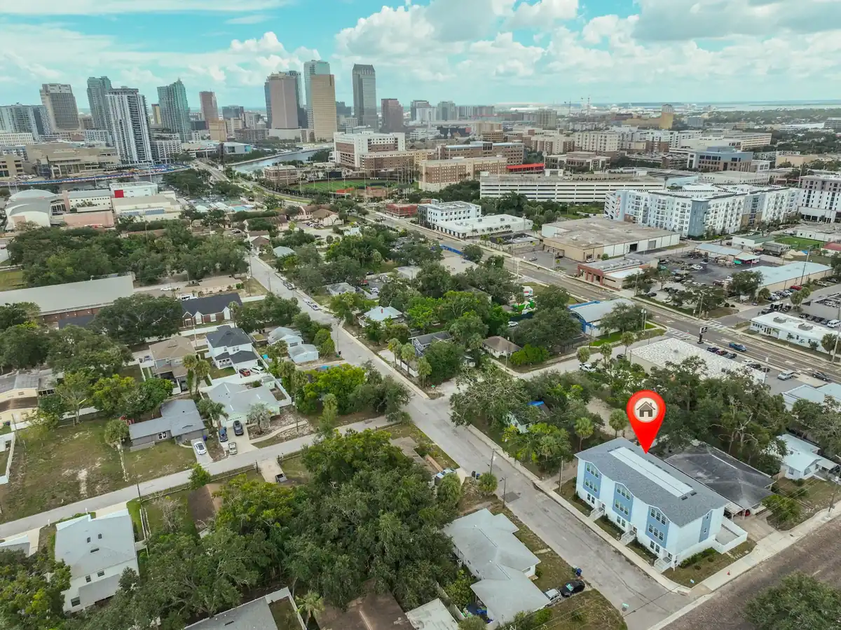Aerial view over Tampa townhome construction with the downtown skyline behind