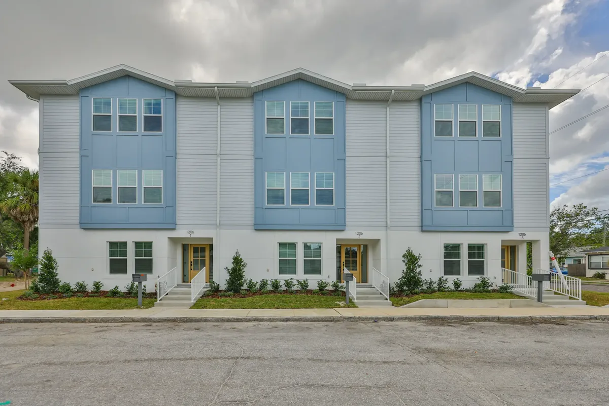 Three-unit new construction townhome row at 1206 W Lemon Street in Tampa