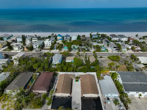 Aerial view of the compound showing proximity to the Gulf of Mexico and beach community.