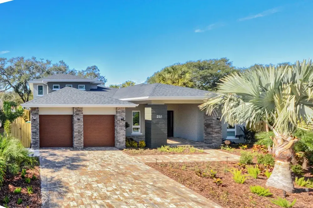 Single story South Tampa pool home with the owners retreat on the first floor
